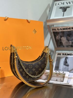 Louis Vuitton Moon Crescent Handbag