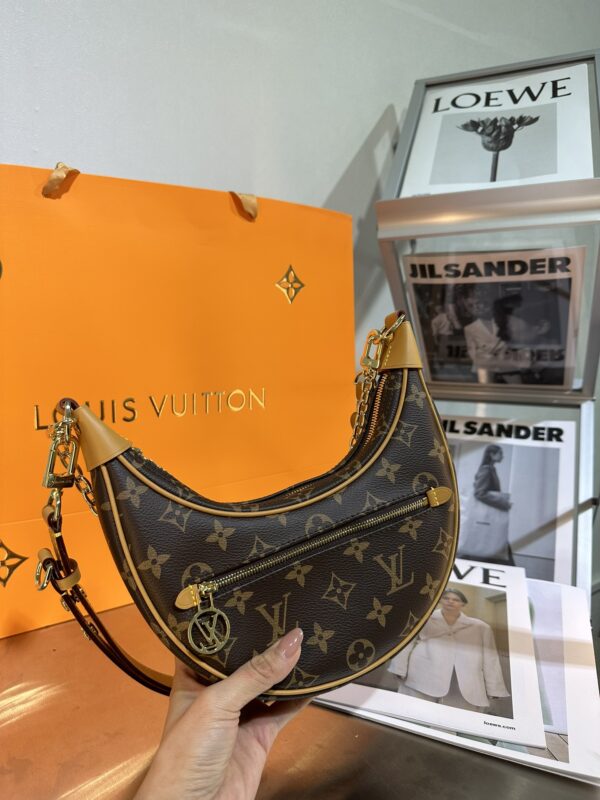 Louis Vuitton Moon Crescent Handbag