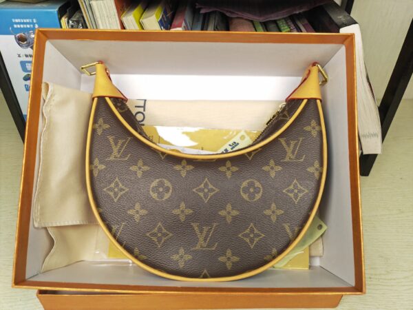 Louis Vuitton Moon Crescent Handbag